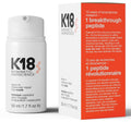K18 Biomimetic Hairscience leave-in molecular repair hair mask bottle next to its retail box, featuring white and light red packaging with black text.